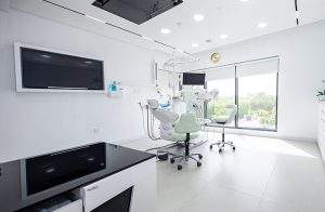 Dental Treatment Room – Cosmedent Medical Center Modern dental treatment room at Cosmedent Medical Center Dubai