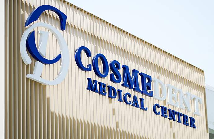 Cosmedent Medical Center Dubai – Clinic Entrance and Logo